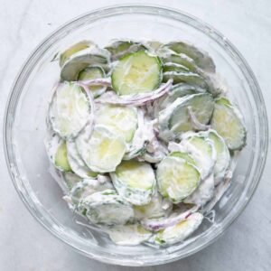 Mix the cucumbers and onions